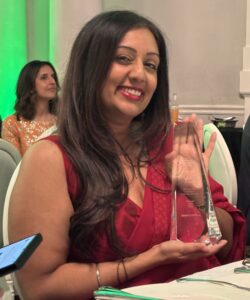 Photo of Simran Prihar with her SABA award